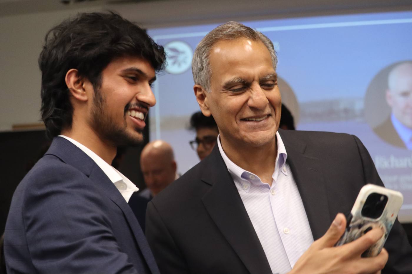 A WFI member with Ambassador Richard Verma at Peace, Power, and Prosperity
